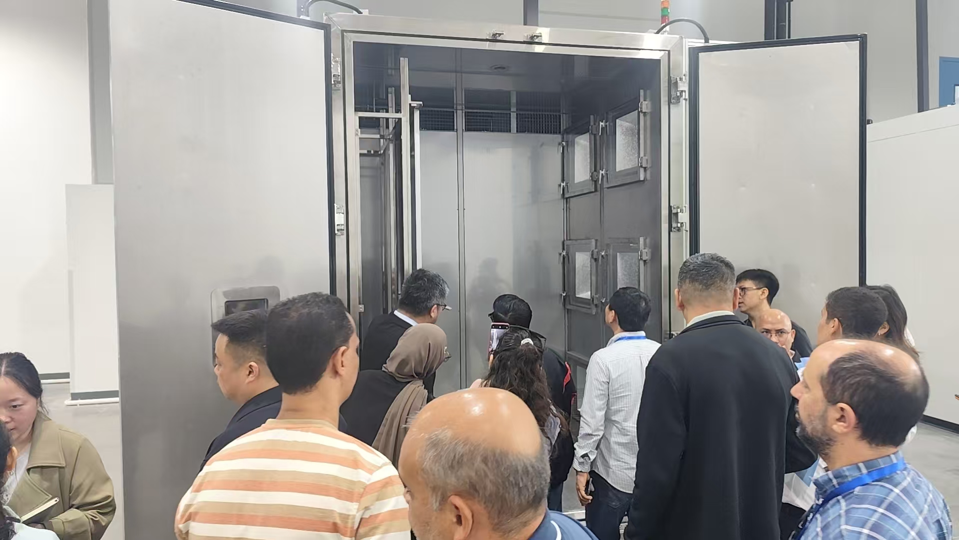 International experts observing equipment operation
