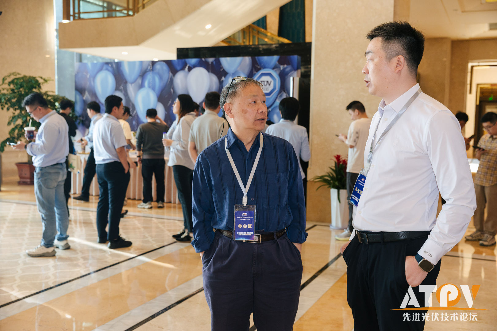 Industry experts attentively listening to the presentation